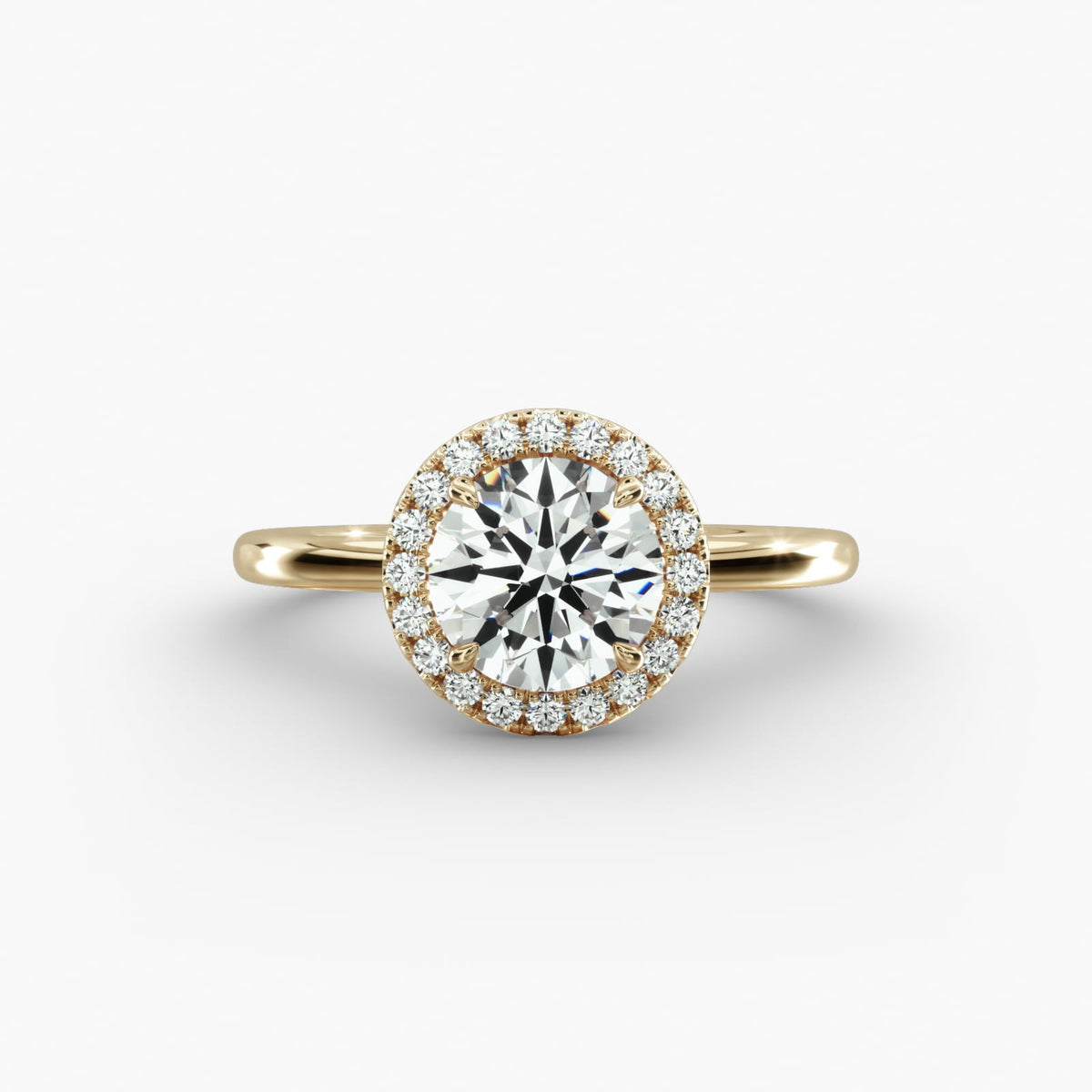 Anillo de Compromiso Round con Halo Oro 18K